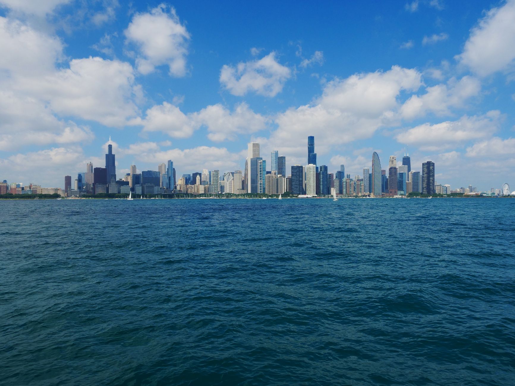 Chicago skyline and Lake Michigan under a clear sky