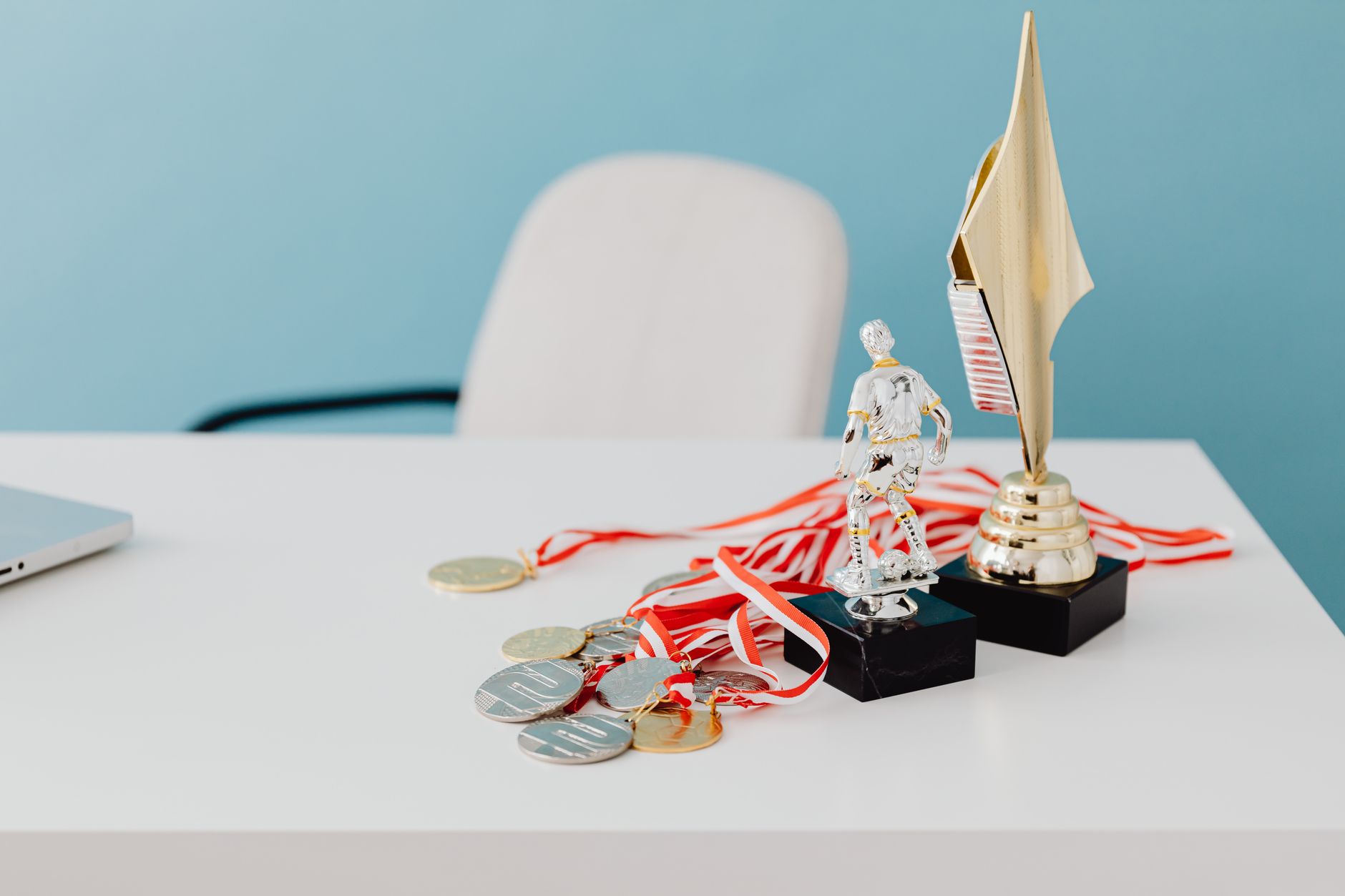 Gold trophies on display, representative of the South-South Award