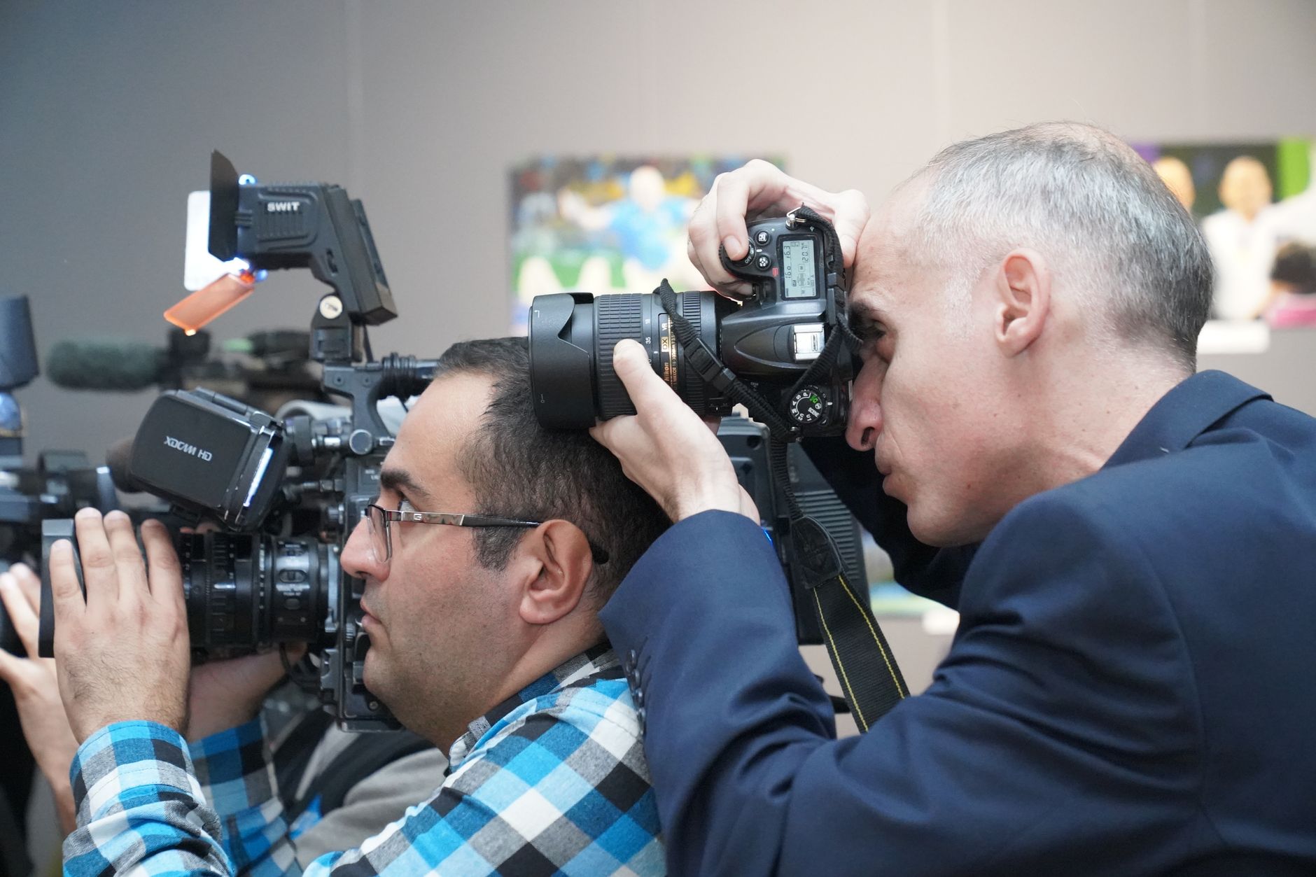 Photographers covering an event, representative of media at the South-South Awards
