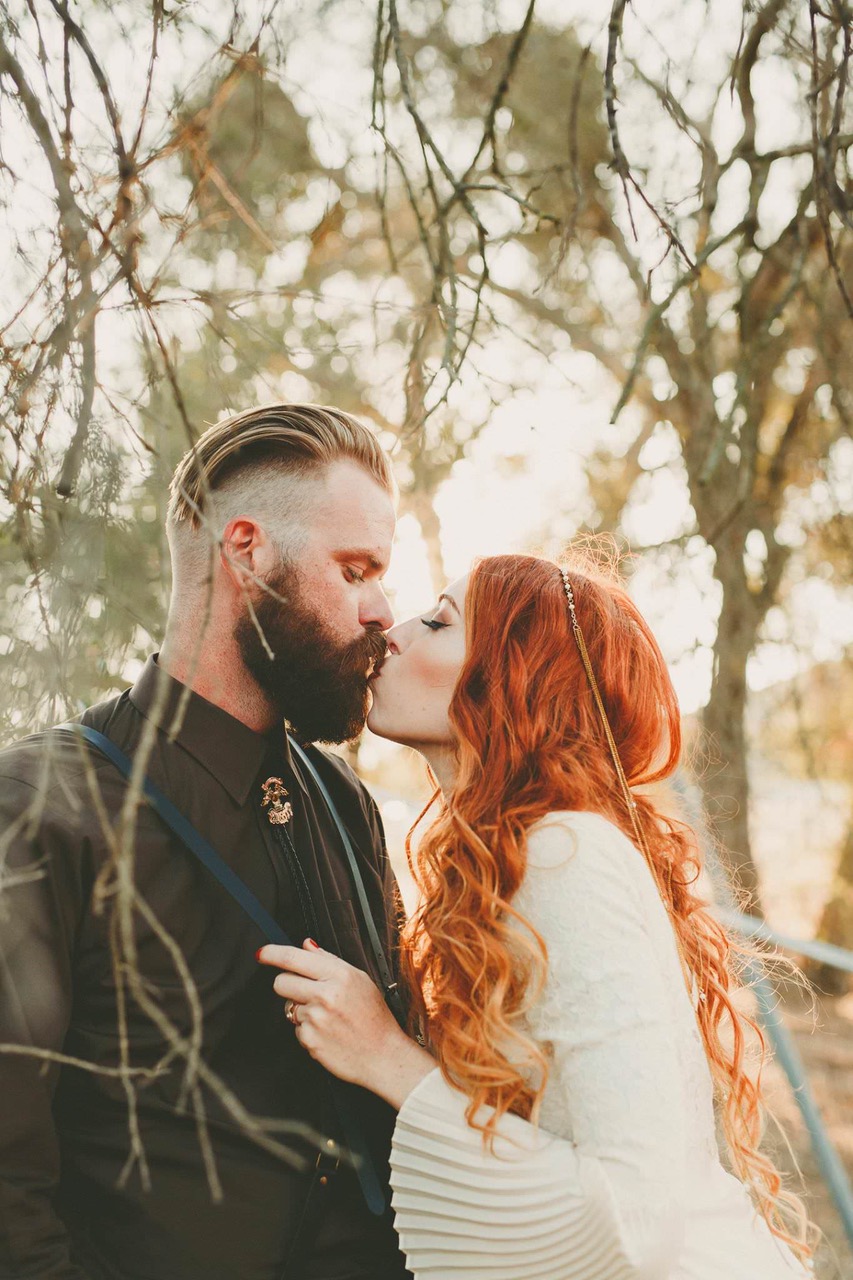 Ryan Horban Photography wedding couple kissing in an autumn forest setting